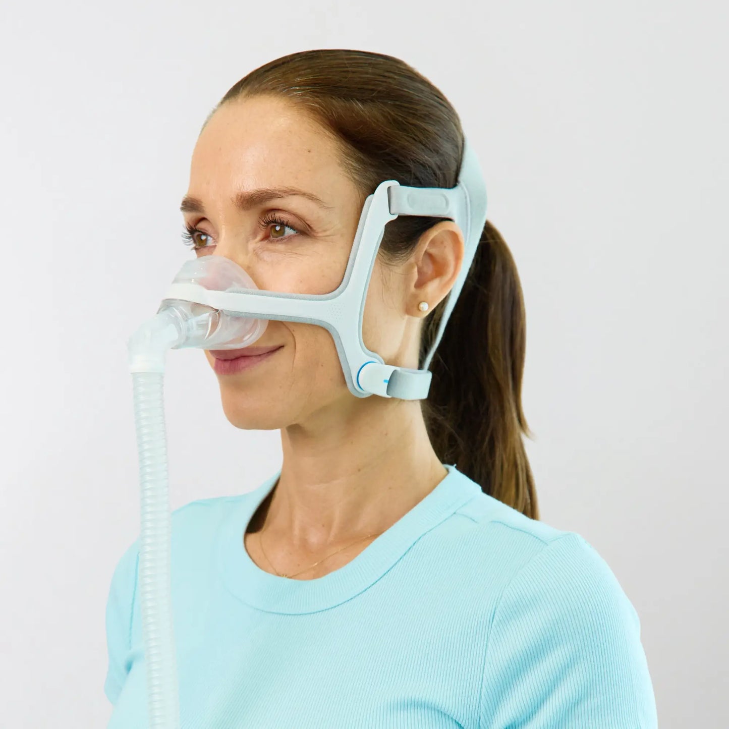 man using the ResMed AirFit N20 Nasal CPAP Mask with Headgear side view