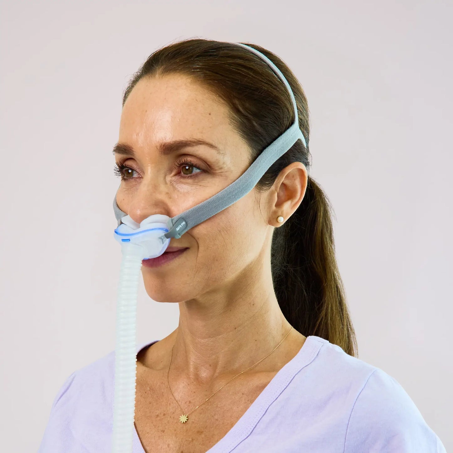 side view of woman wearing AirFit P10