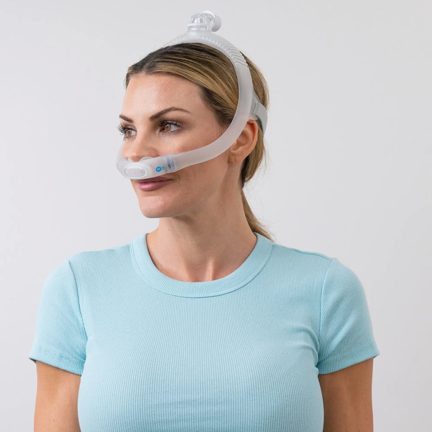 woman wearing the ResMed AirFit P30i Nasal Pillow Mask side