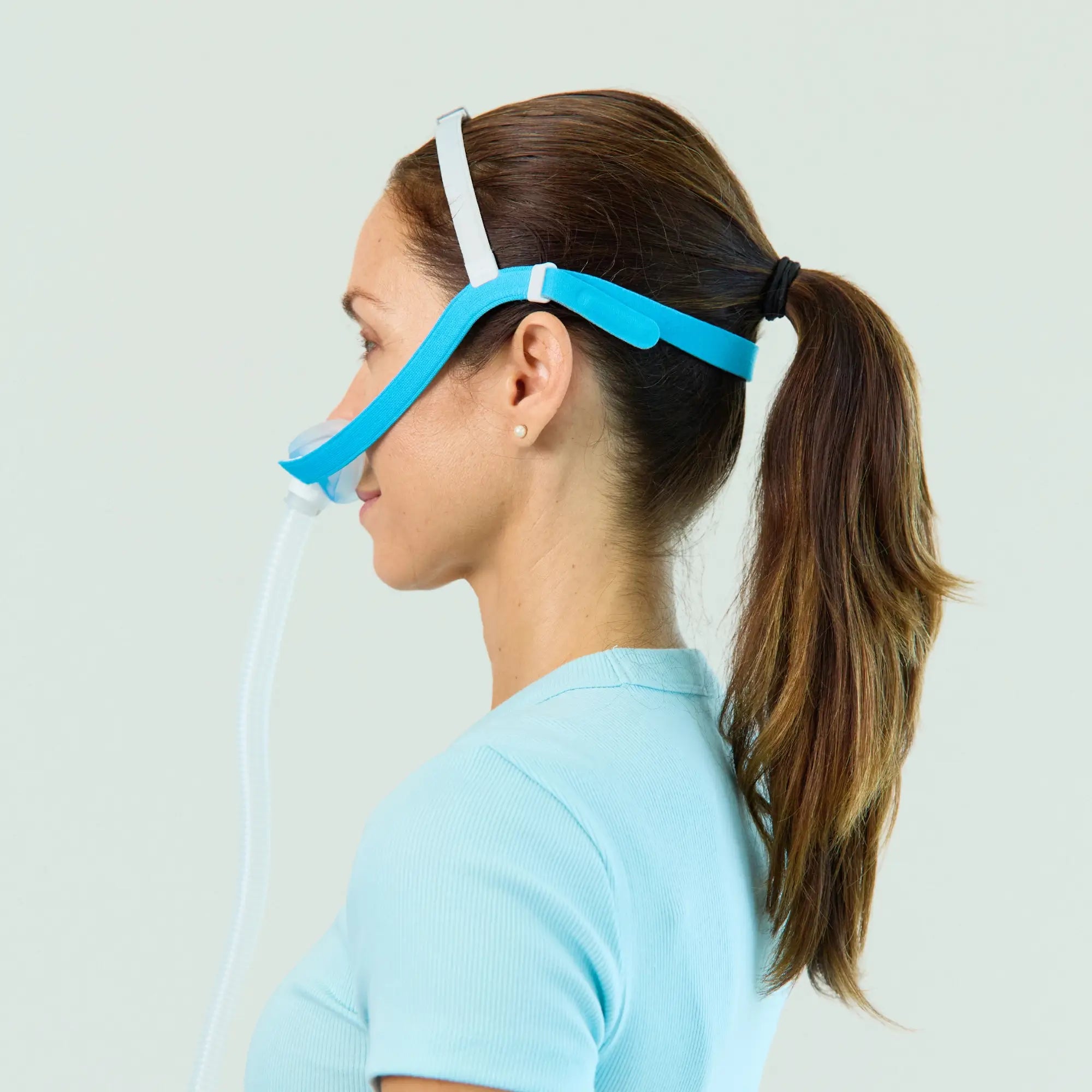 woman wearing the Evora Nasal CPAP Mask side view