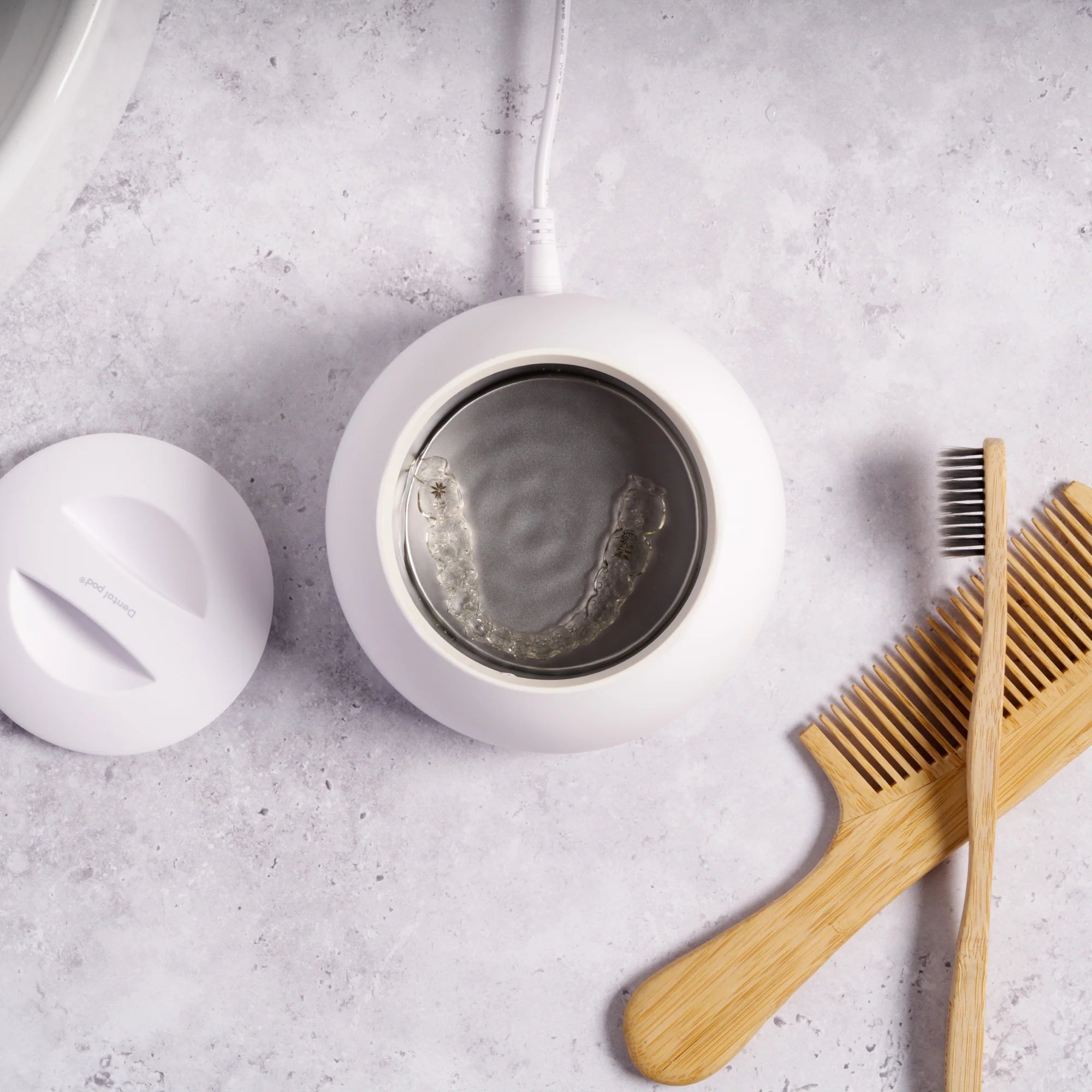 Zima Dental Pod Ultrasonic Cleaner fopen with aligners