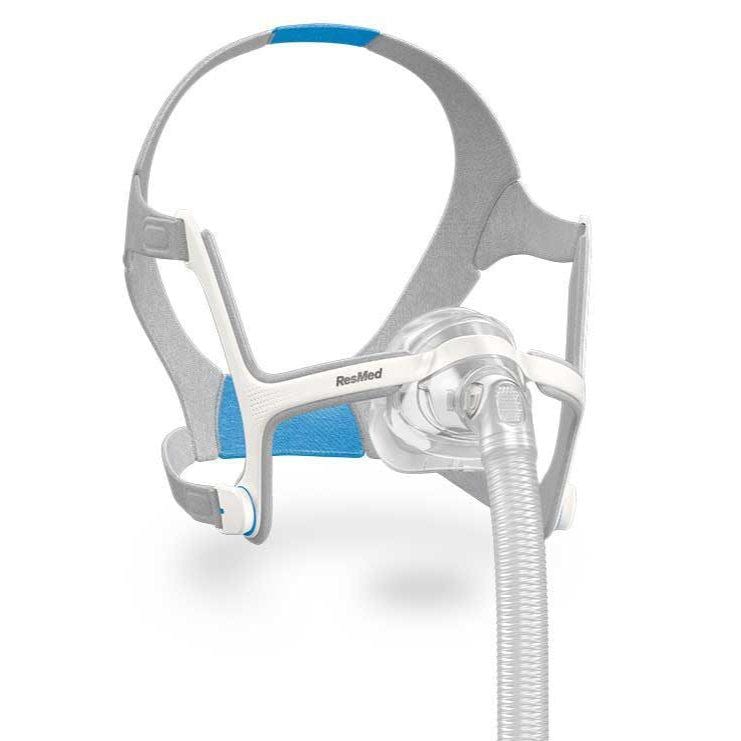 Isometric view of grey headgear with blue pad and a soft grey frame system with memory foam nasal cushion for the AirTouch N20 Nasal Mask.