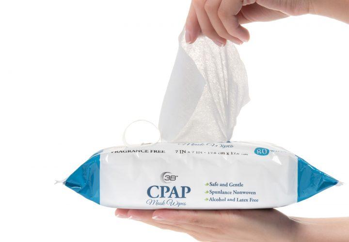 Hand grabbing wipe of CPAP Wipes (Fragrance Free - Aloe) - 80/pack