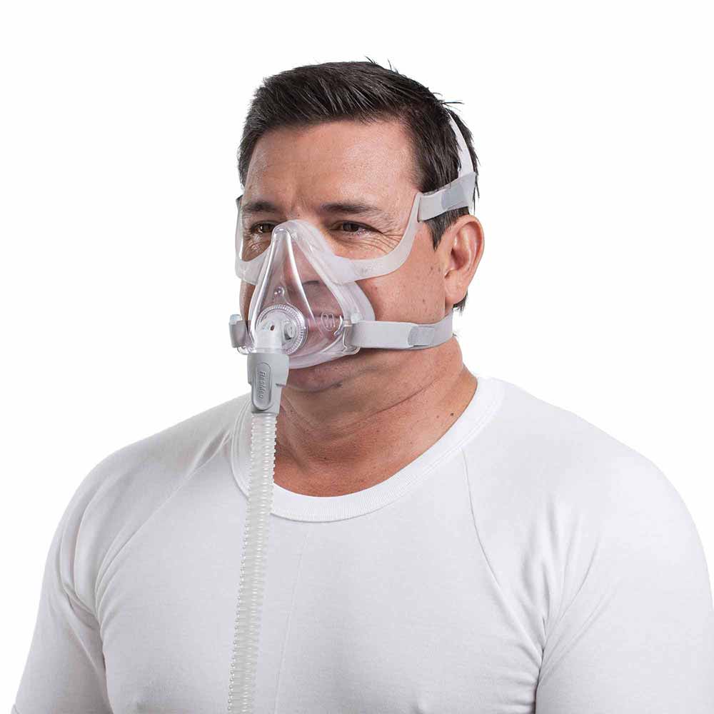 Man using ResMed AirFit F10 Mask.
