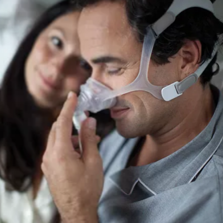 Man wearing wisp nasal mask.