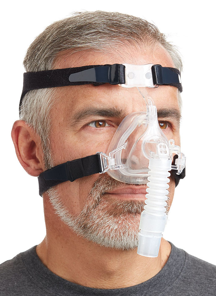 Adult man using the Nasal Fit Deluxe EZ Mask with black Headgear by Drive.