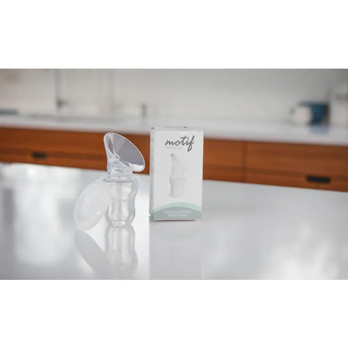 Motif breast pump next to box.