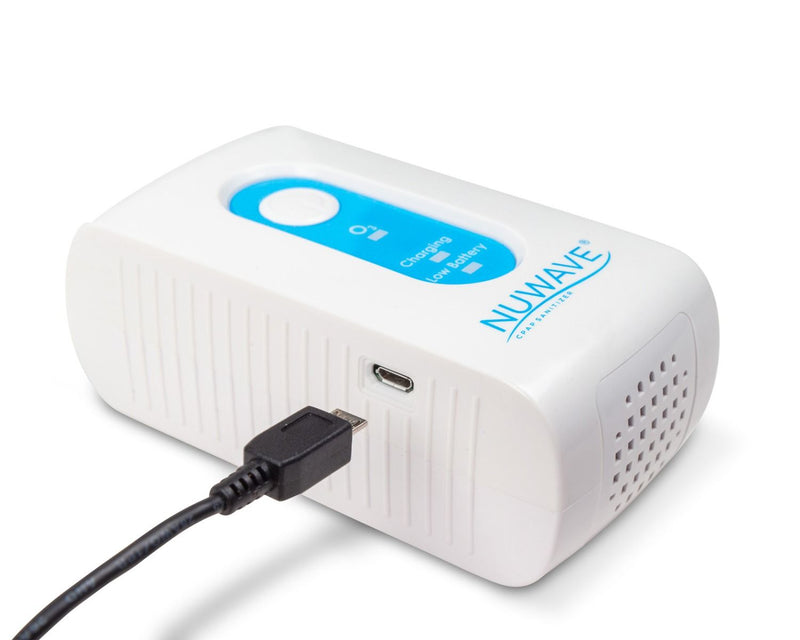 White with blue part CPAP machine cleaner in travel size with black plug in cable.