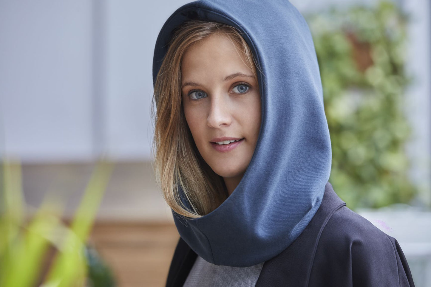 Woman wearing the hood.