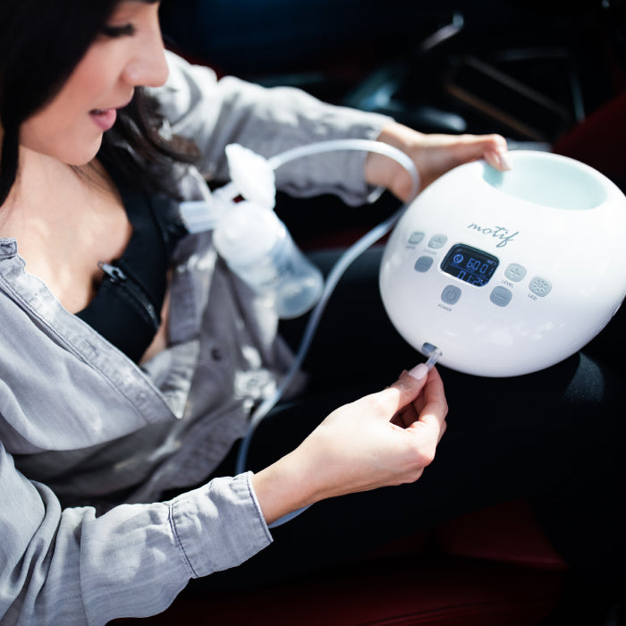 Plugging in the Luna electric breast pump!