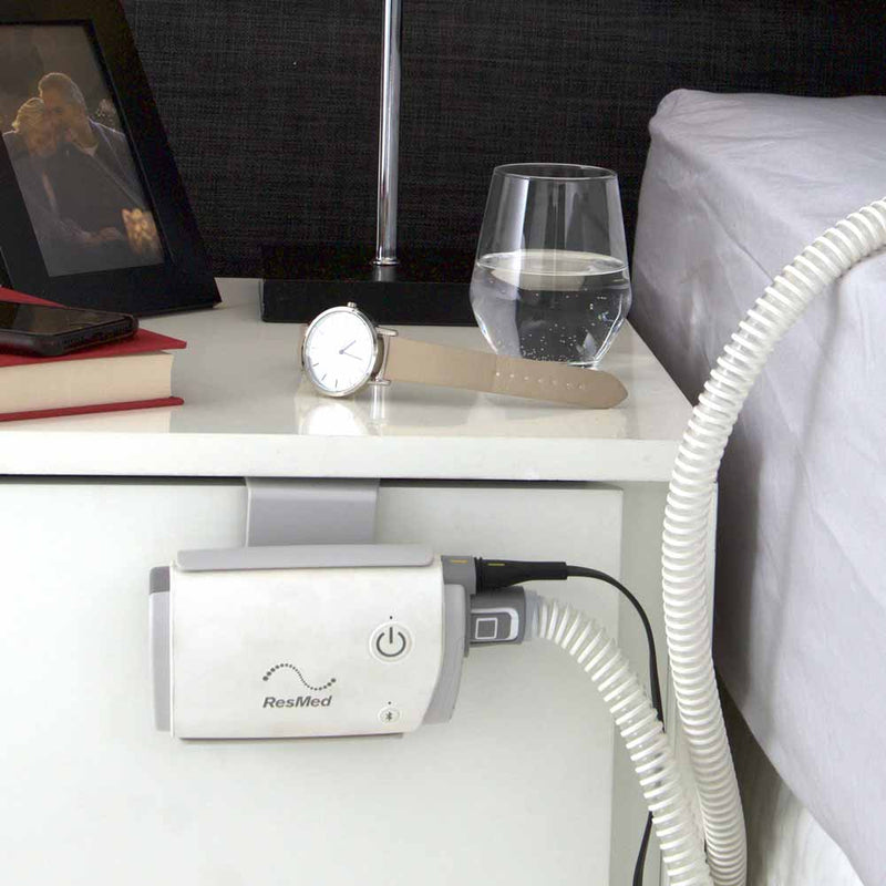AirMini mount system on nightstand.
