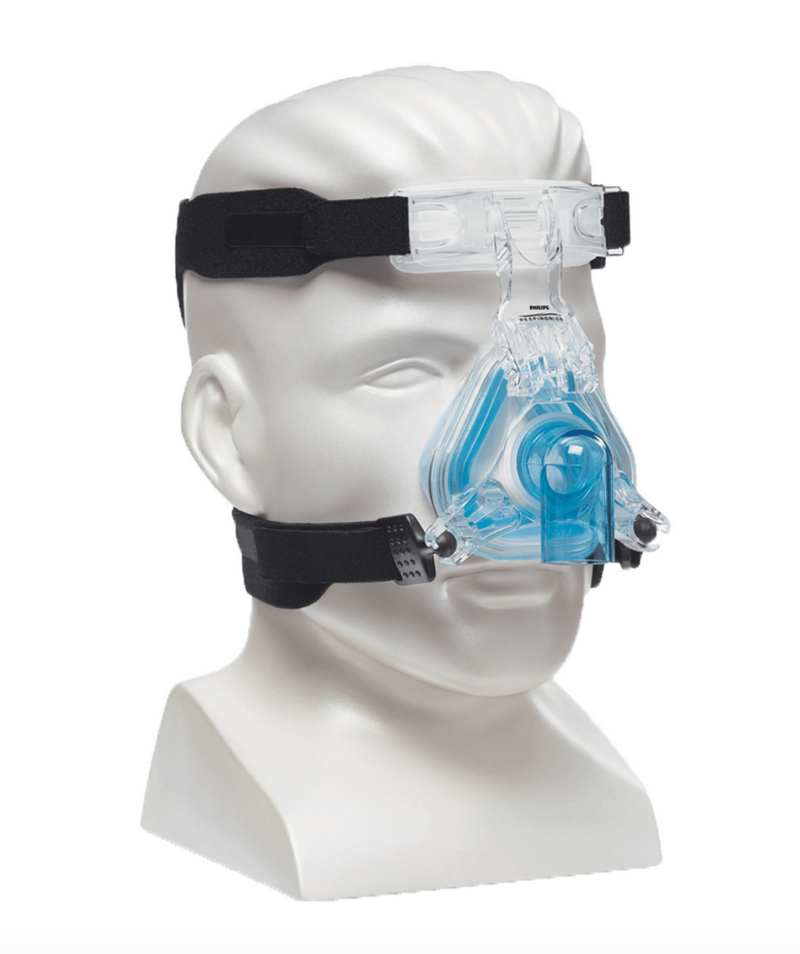 Side view of mannequin with ComfortGel Blue Nasal CPAP Mask with headgear.