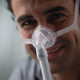 Man wearing Frame for Respironics Wisp Nasal Mask