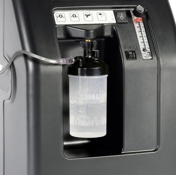 Closeup view of water machine of Compact 525DS Oxygen Concentrator Bundle - 5 LPM