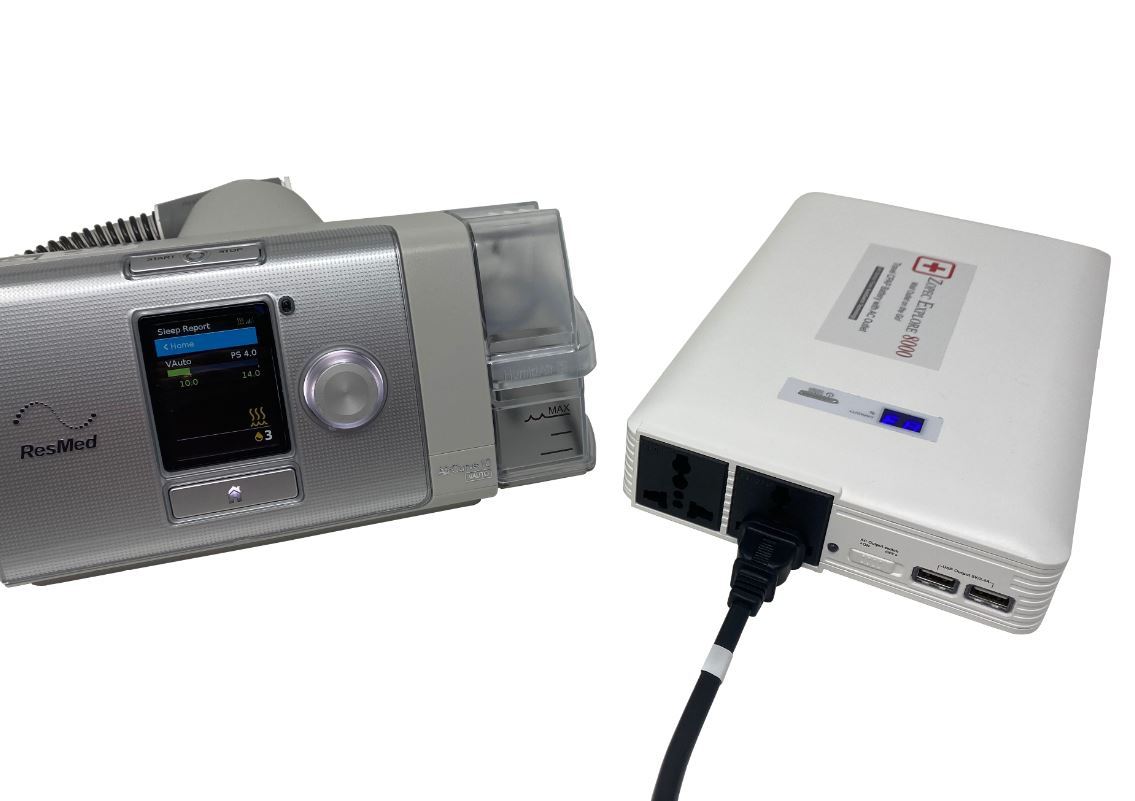 Top angled view of Zopec Explore 8000 next to CPAP
