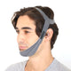Left side of face wearing chin strap.