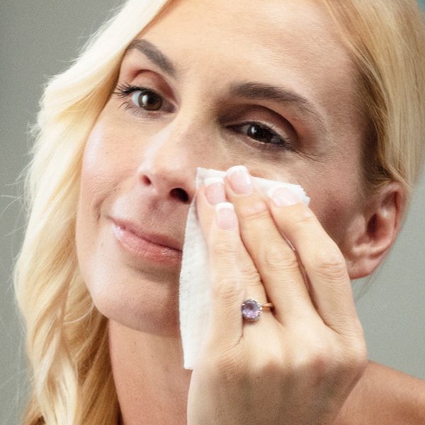 Woman using DreamPrep Wipes