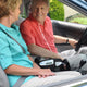 Man Driving With Inogen One G3 Portable Oxygen Concentrator.