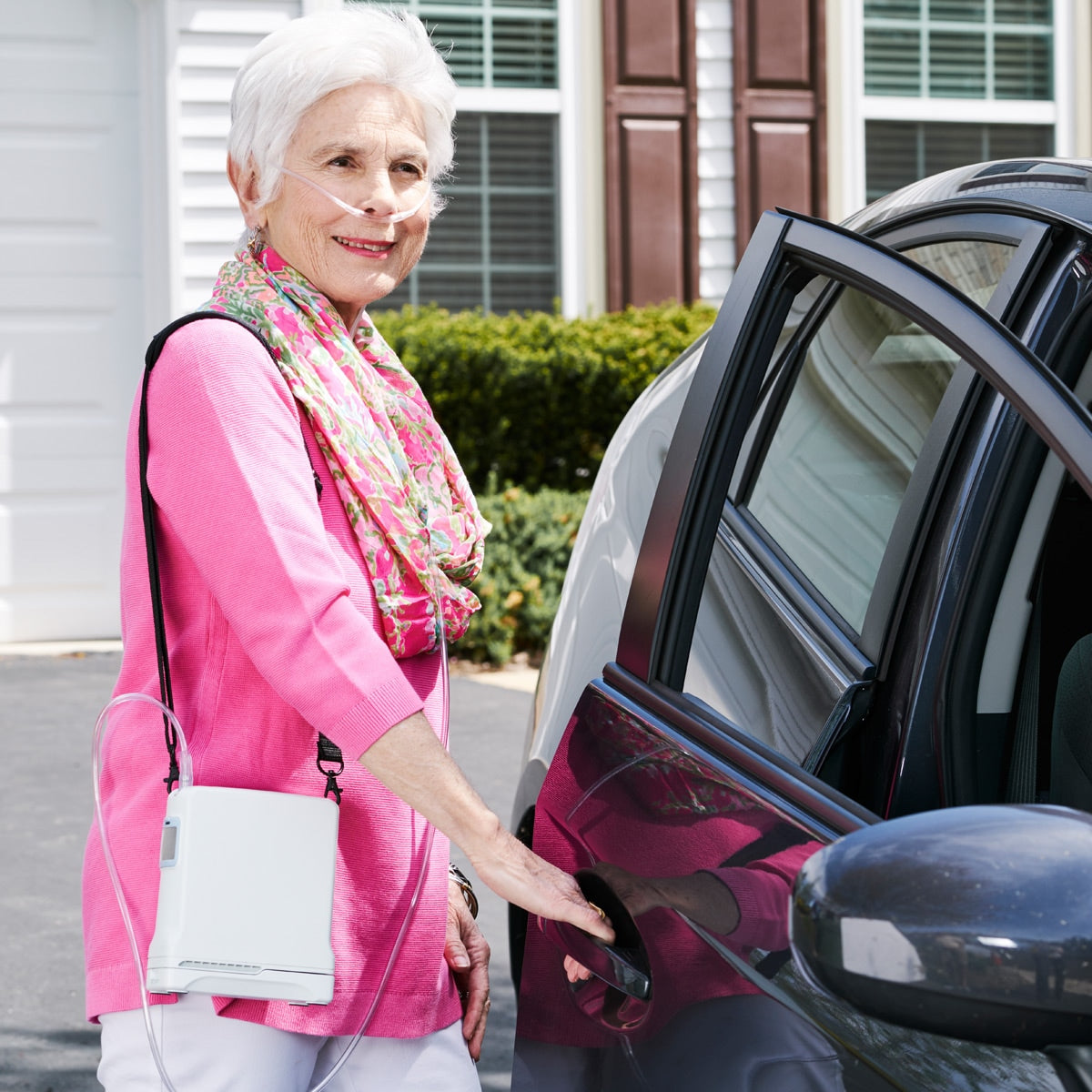 Woman Using Inogen One G4 Portable Oxygen Concentrator On The Go.