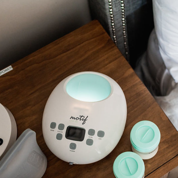 Breast pump on nightstands.