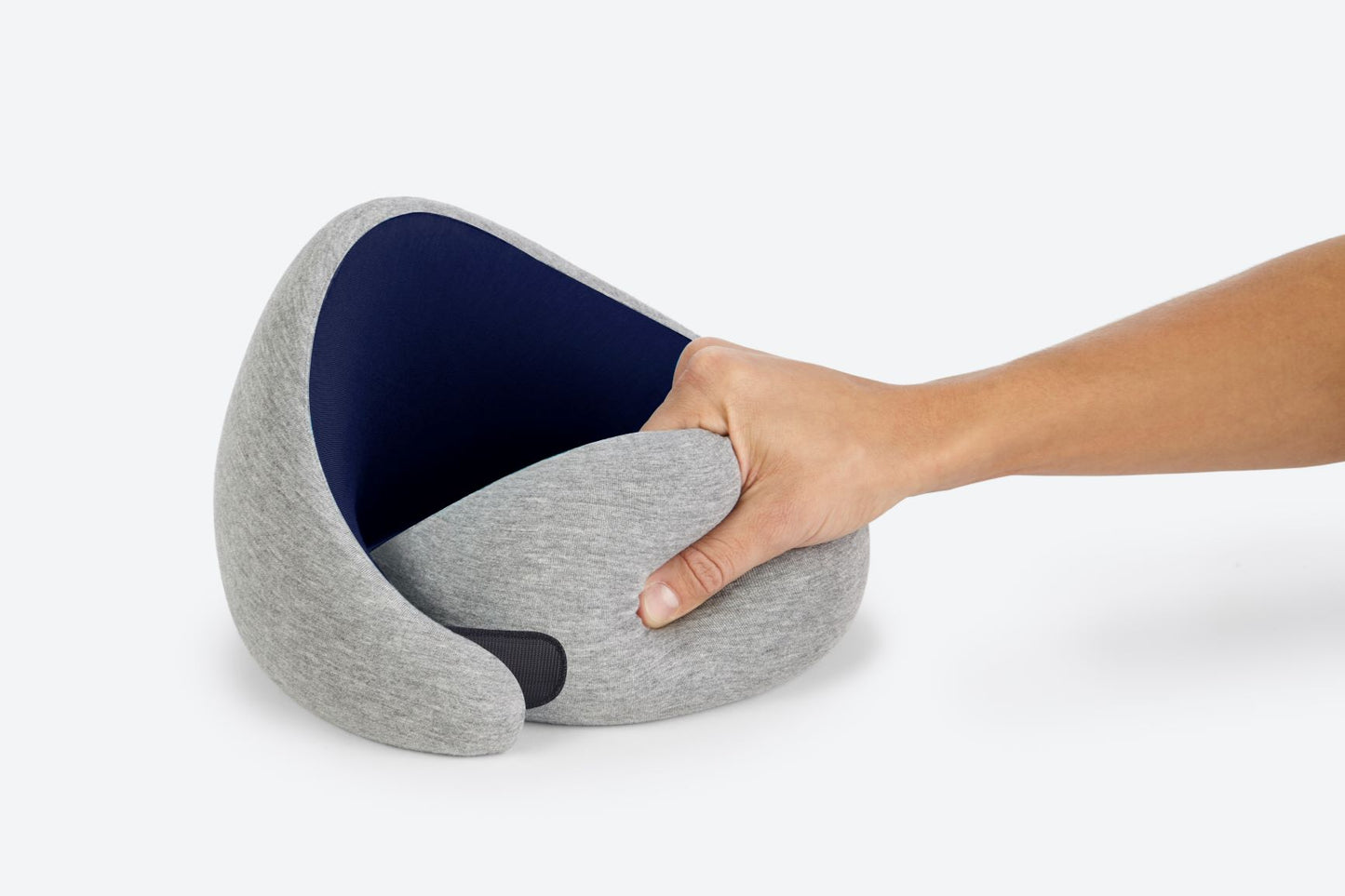 Pressing On The Deep Blue Neck Pillow.
