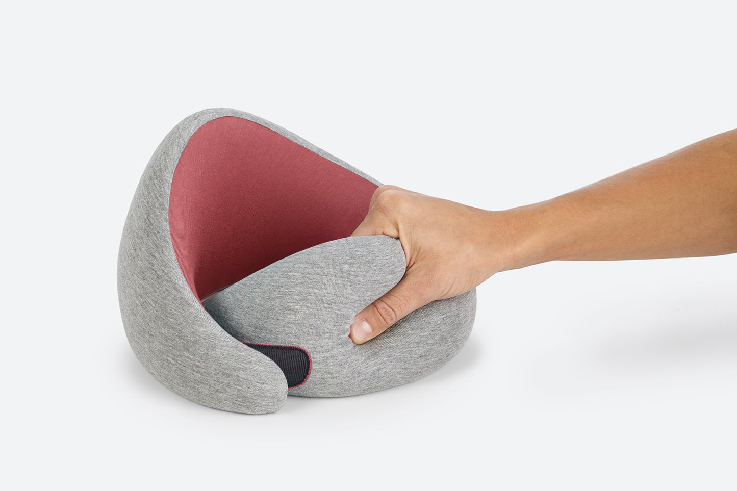 Woman Pressing In To The Dreamtastic Neck Pillow.