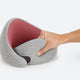 Woman Pressing In To The Dreamtastic Neck Pillow.