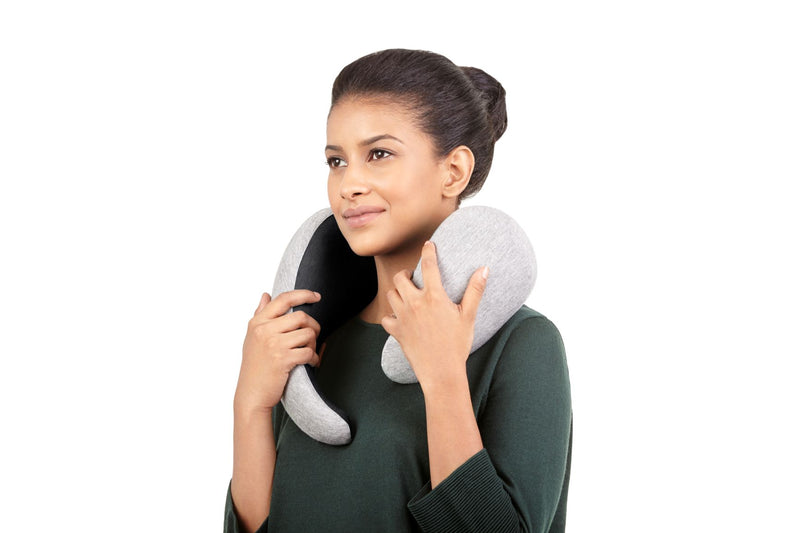 Woman Trying On Neck Pillow.