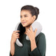 Woman Trying On Neck Pillow.