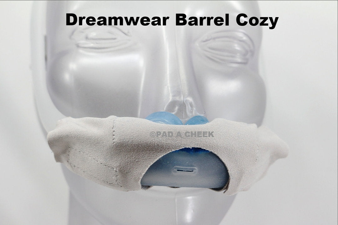 Gray barrel cozy wrapped around a DreamWear CPAP mask cushion, front view on mannequin head