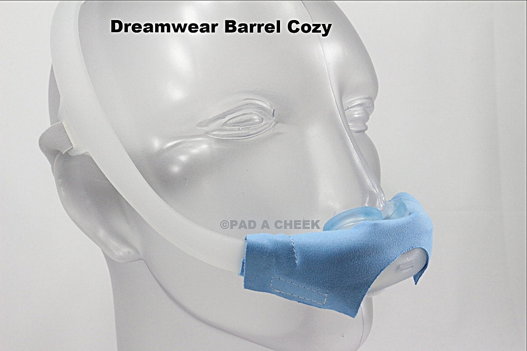 Blue barrel cozy covering the DreamWear mask cushion under the nose, angled side view on mannequin