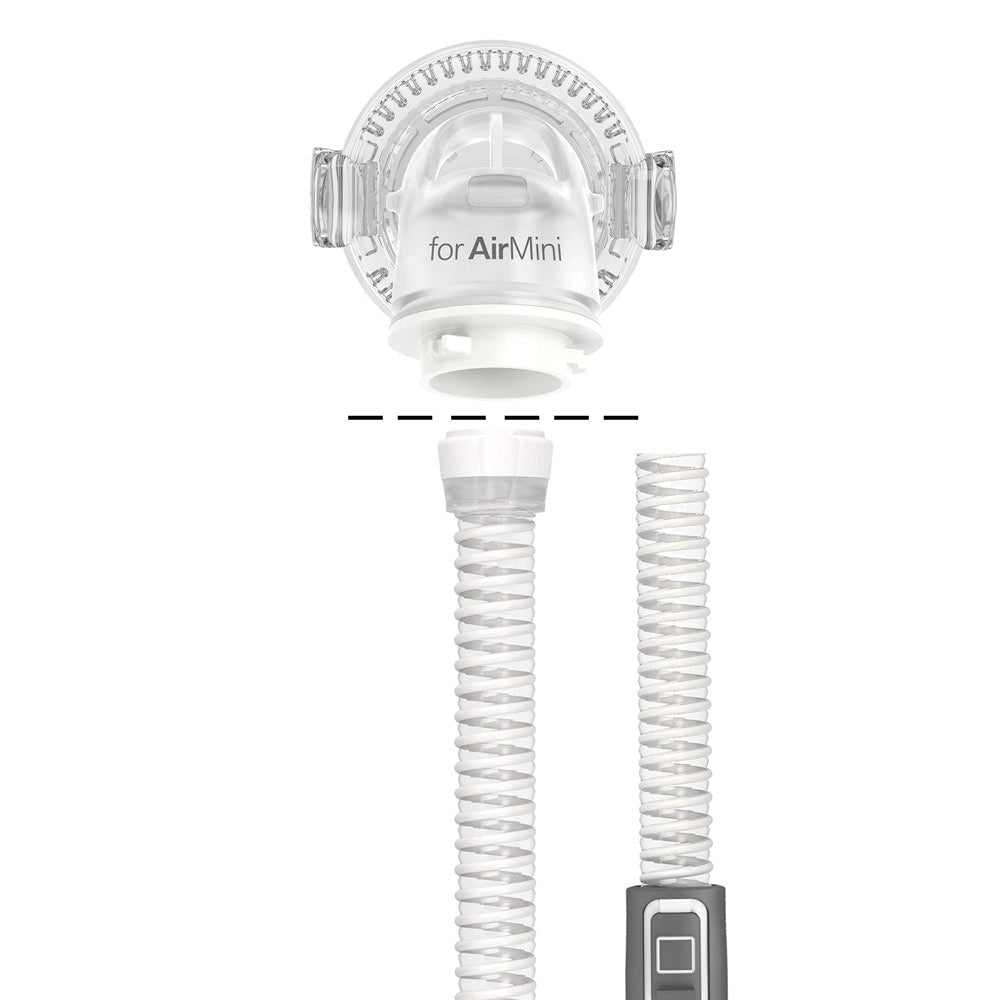 ResMed AirMini mask connector positioned above slim tubing to show tube attachment